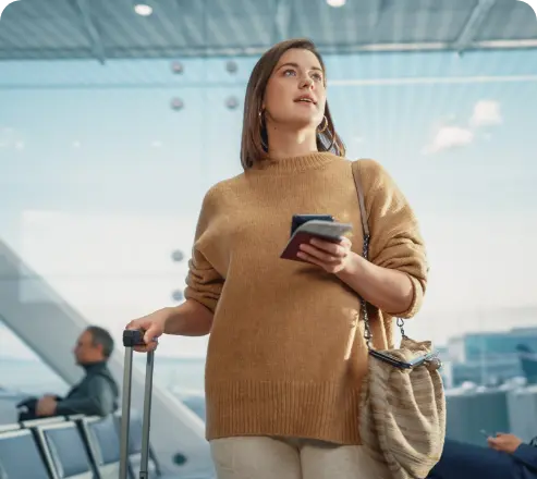 Woman winking with paper airplane